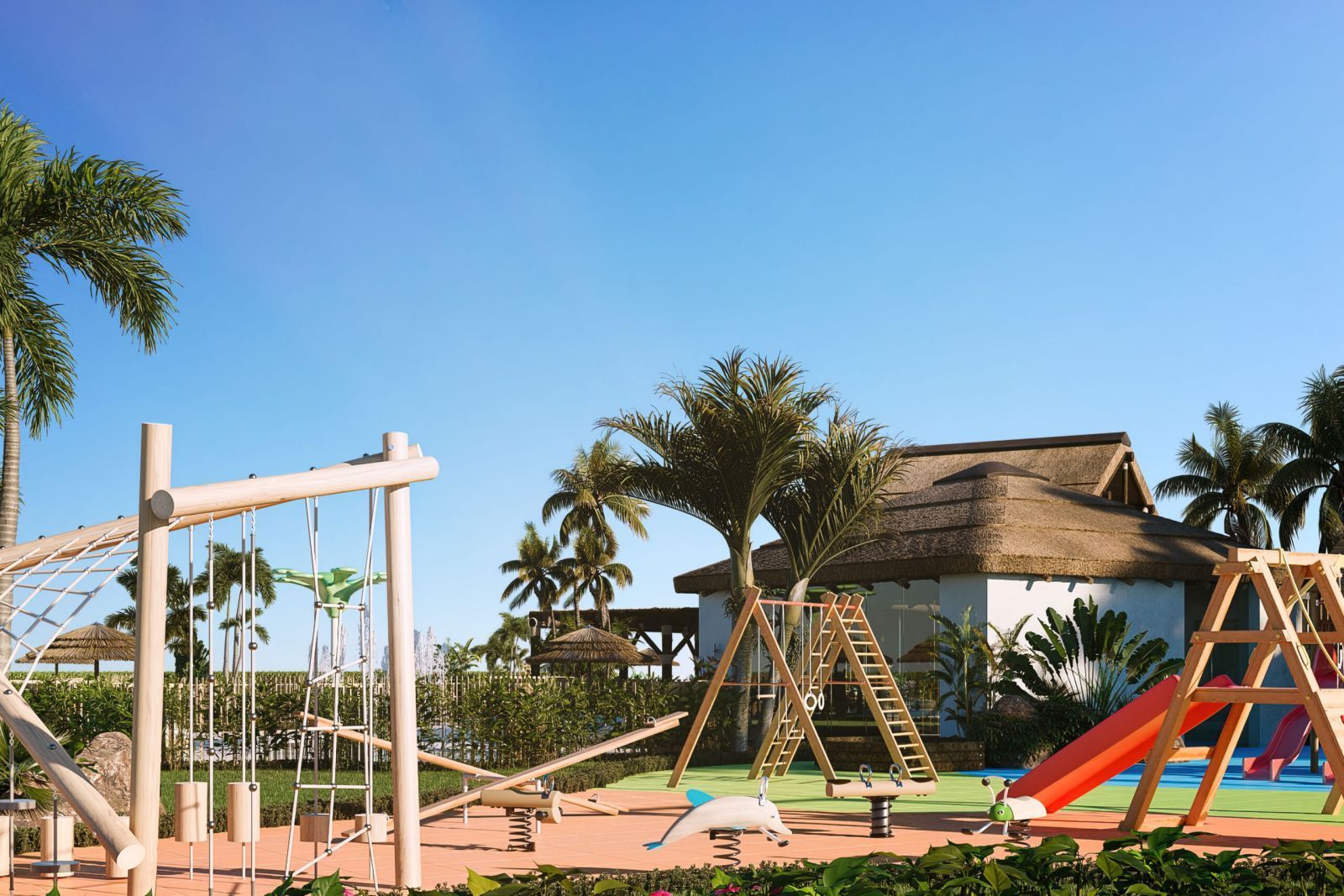 Kinderspeeltuin bij Royal Palms met schommels, glijbaan en wip.